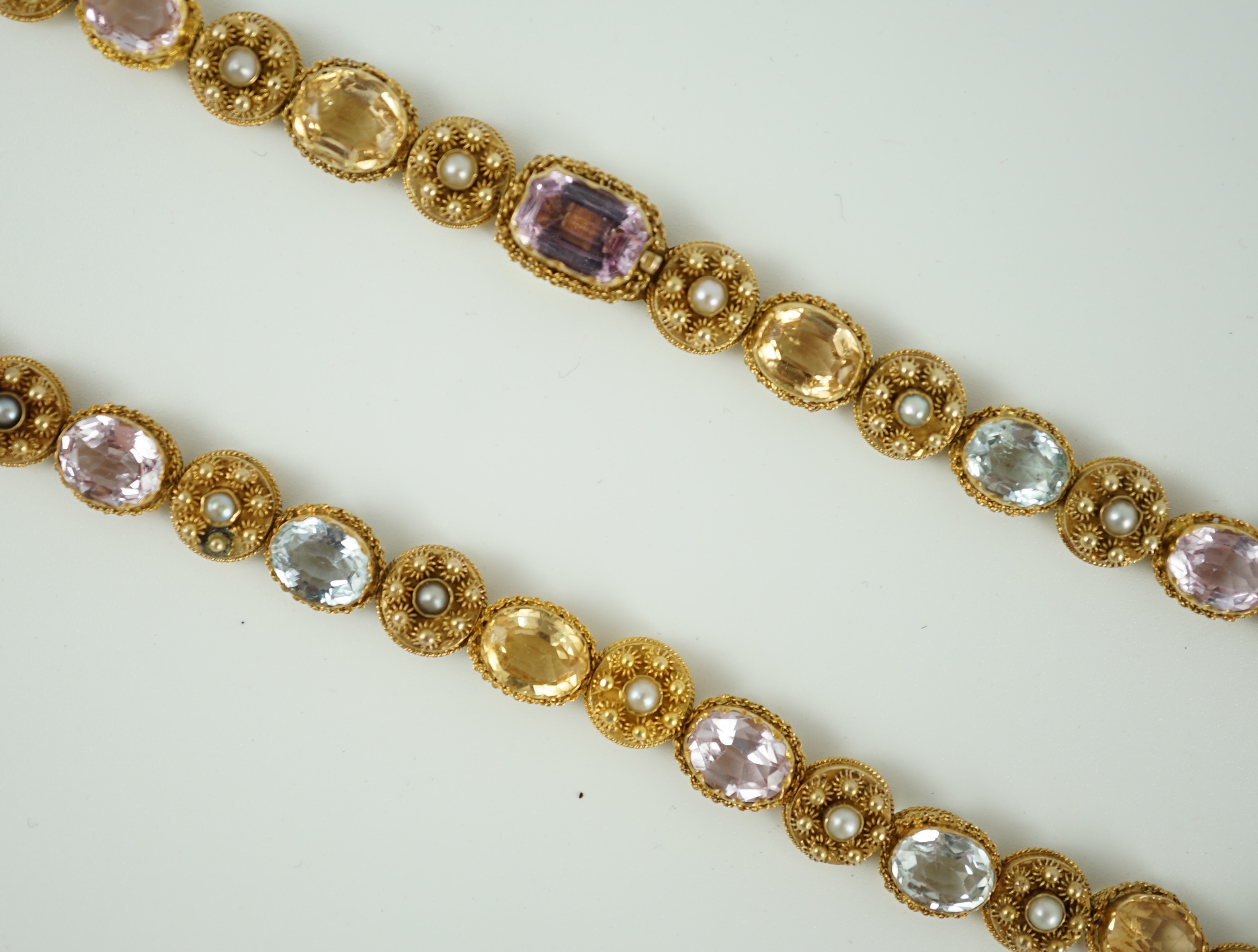 A 19th century gold, pink topaz, seed pearl, citrine and aquamarine set choker necklace